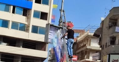 القانون يحظر وضع ملصقات وإعلانات على واجهات المبانى والأسطح والعقارات الأثرية