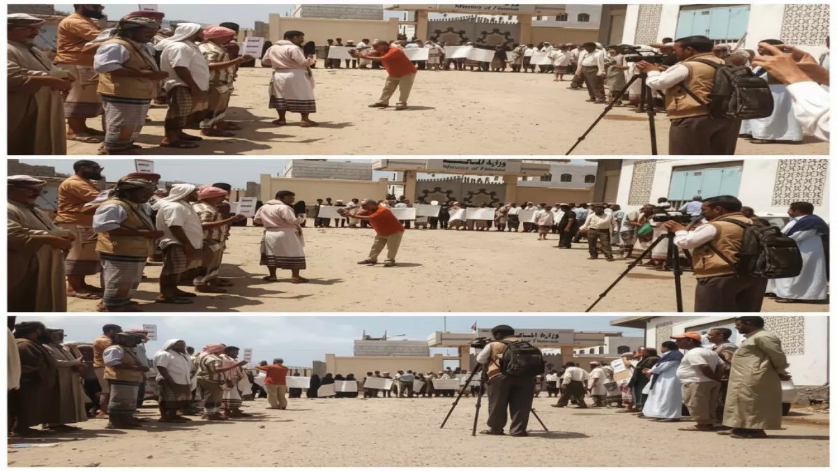 عاجل: موظفو البيضاء يواجهون الموت جوعاً... وقفة احتجاجية أمام المالية تطالب بالإنقاذ الفوري!