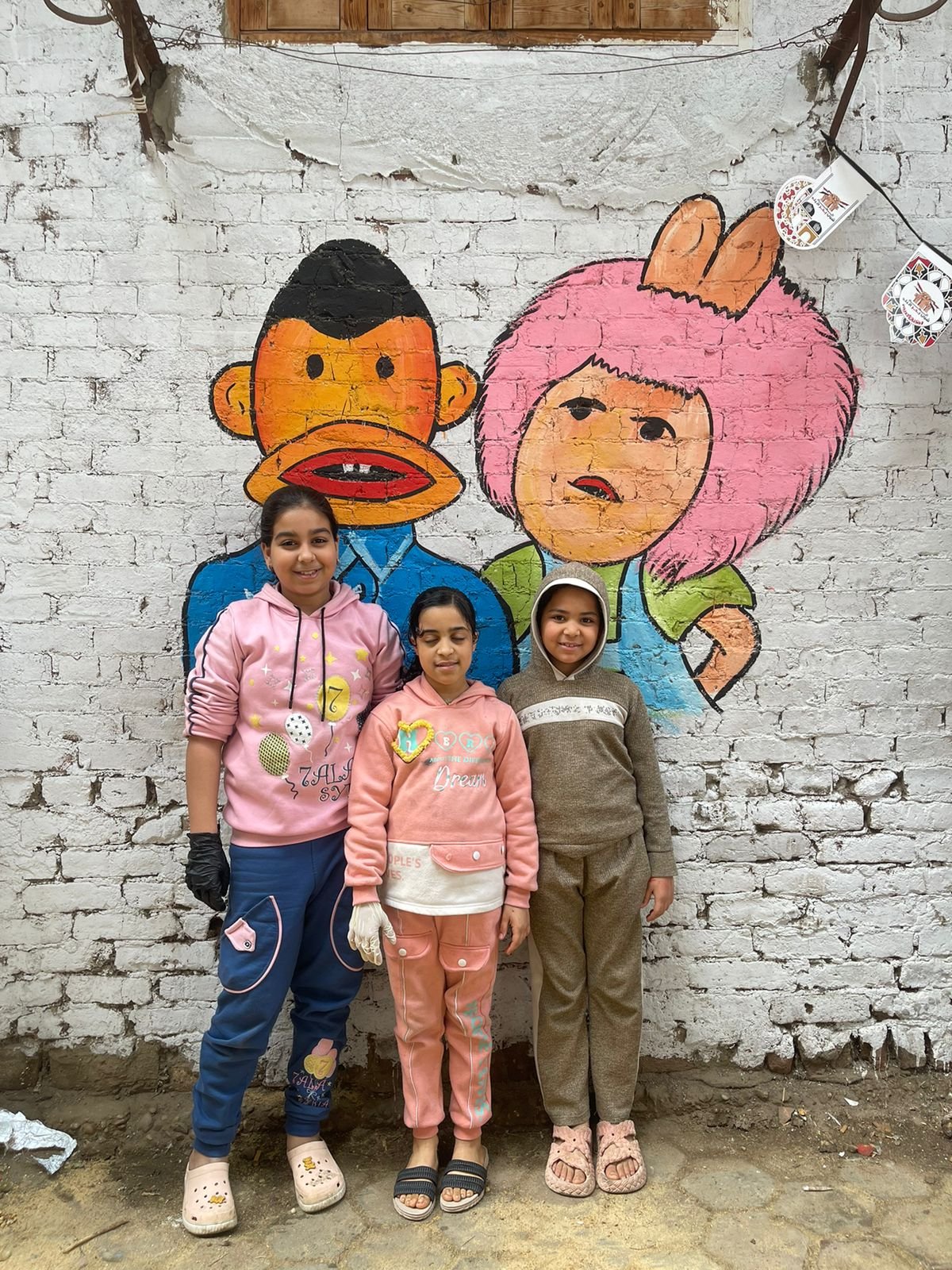 استعدادات مبهجة للأطفال لمائدة إفطار أهالى بحر البلد بالوراق