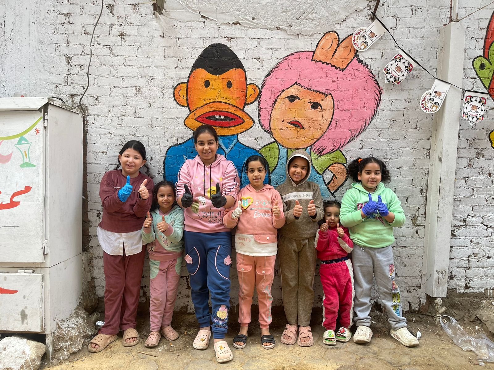 استعدادات مبهجة لمائدة إفطار أهالى بحر البلد بالوراق