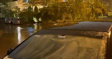 حبات الثلج تضرب التجمع الخامس وسط أمطار غزيرة رعدية.. صور